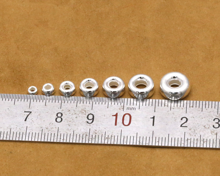 Hạt xỏ dẹt trơn