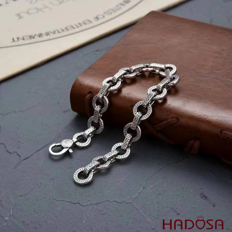 Lắc tay nam bạc Thái tròn họa tiết