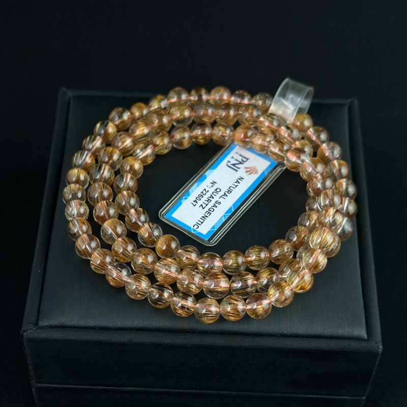 Vòng cuốn Thạch Anh tóc nâu 6.5mm chuẩn 7A