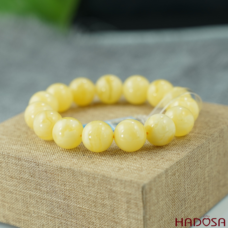 Vòng Hổ Phách Baltic vàng bơ 14mm