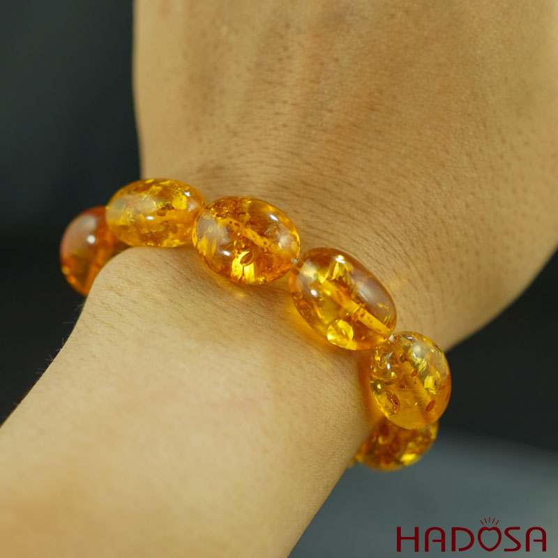 Vòng Hổ Phách vàng đậm hạt olive 11*14mm