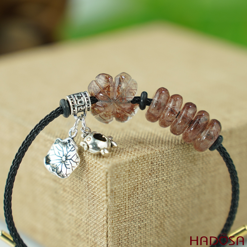 Vòng ngũ điếu tóc đỏ mix cỏ 4 lá charm bạc