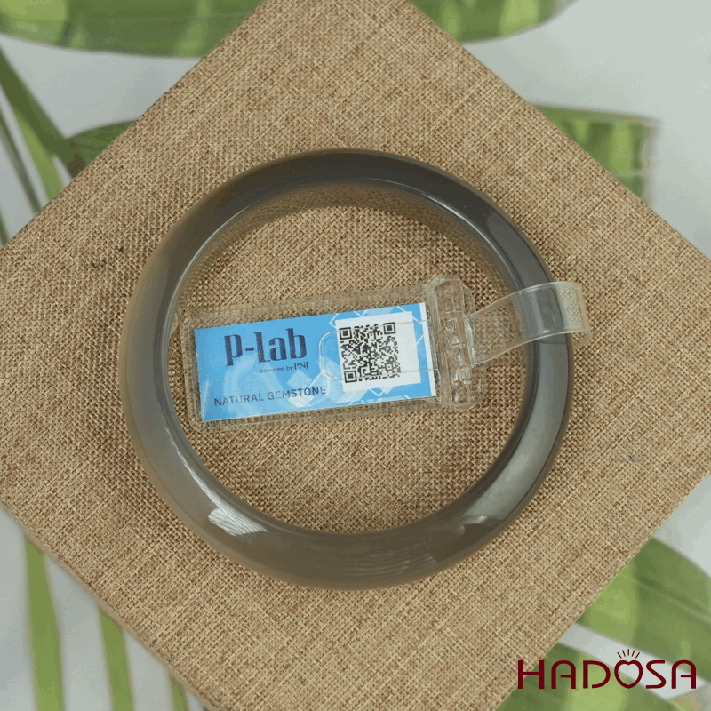 Vòng kiềng mã não xám ghi bản oval ni 50