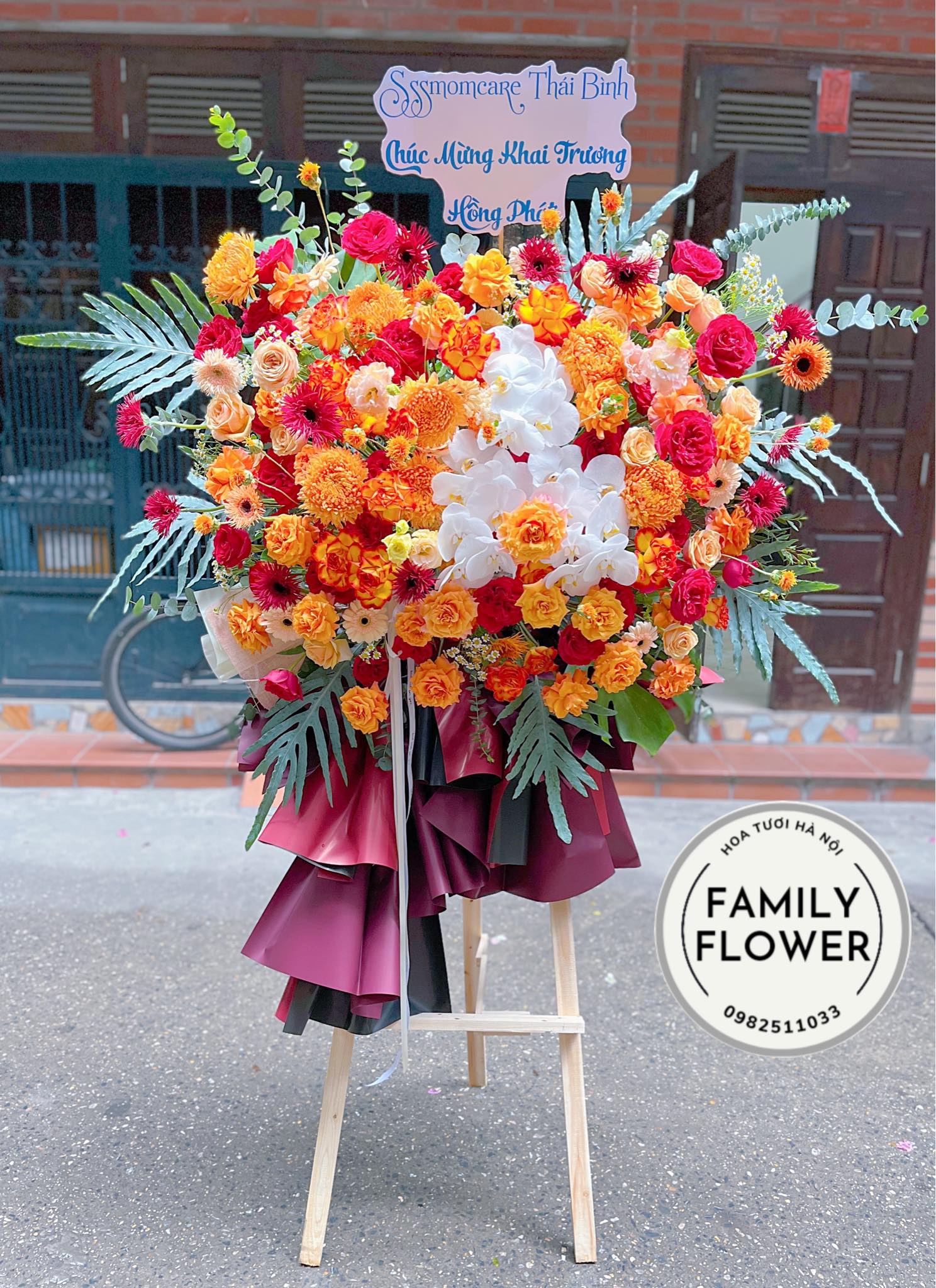 Kệ hoa chúc mừng khai trương tone cam đỏ tại Cầu giấy - Ba đình Hà Nội ! Mua hoa tươi online tại Hà Nội