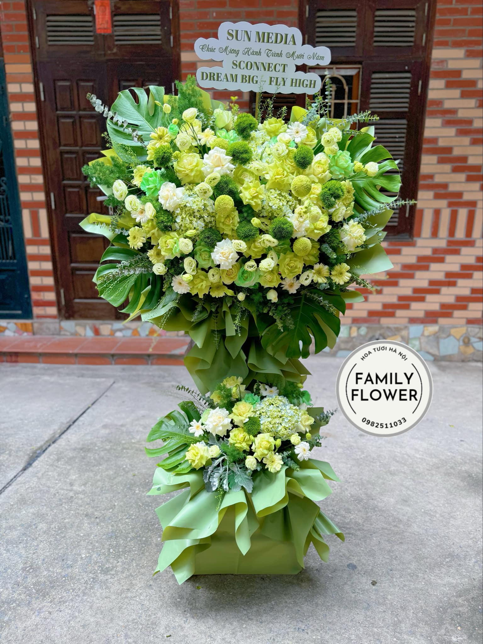 Kệ hoa xanh lá chúc mừng ngày thành lập công ty quận Ba Đình Hoàn Kiếm Hà Nội ! Hoa Hà Nội