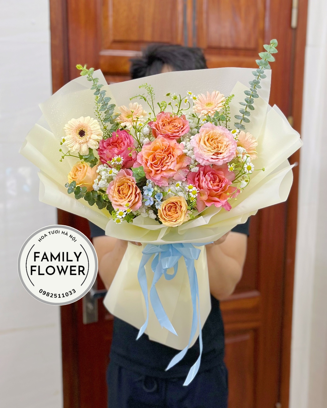 Bó hoa tone cam tặng chồng , bố . em trai ở quận Cầu Giấy -Hà Nội . hoa tươi Hà Nội