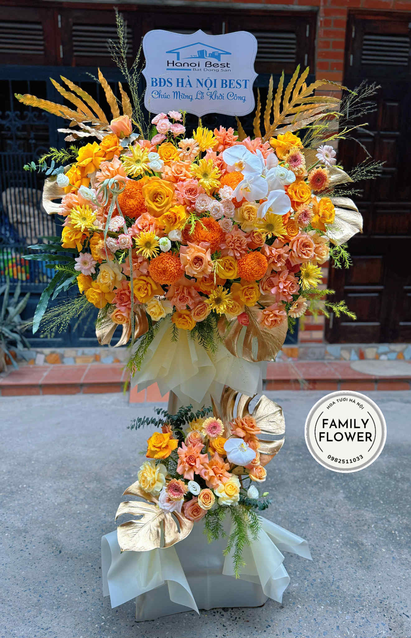 Kệ hoa 2 tầng tone cam tặng chúc mừng sự kiện hội nghị ở Hà Nội ! Mua hoa tươi online Hà Nội