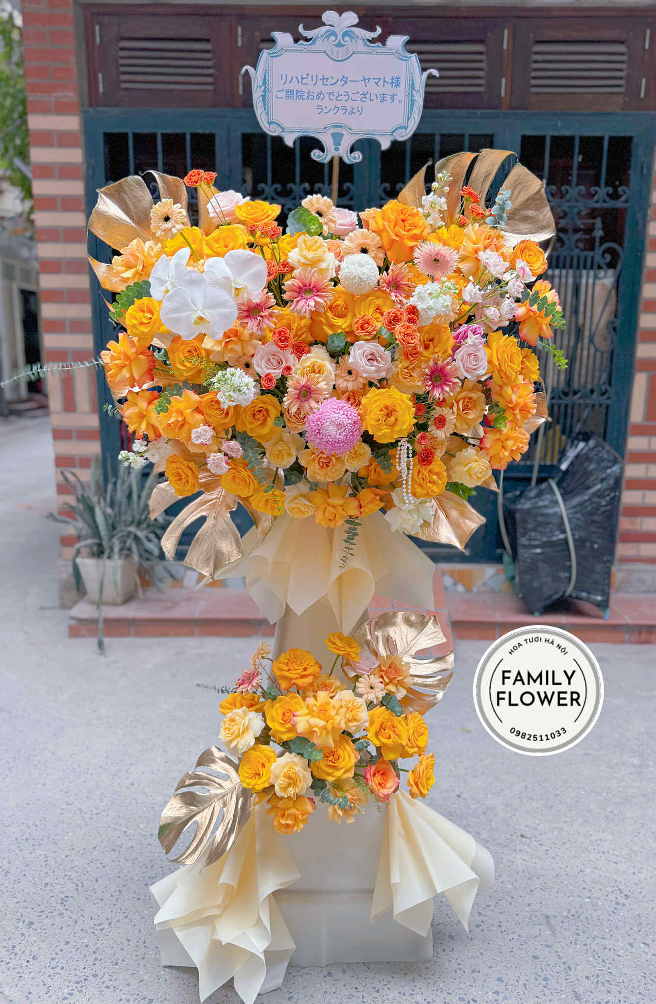 Kệ hoa 2 tầng tone vàng cam tặng khi trương quận Đống Đa ! Hoa khai trương Hà Nội ! Hoa khai trương