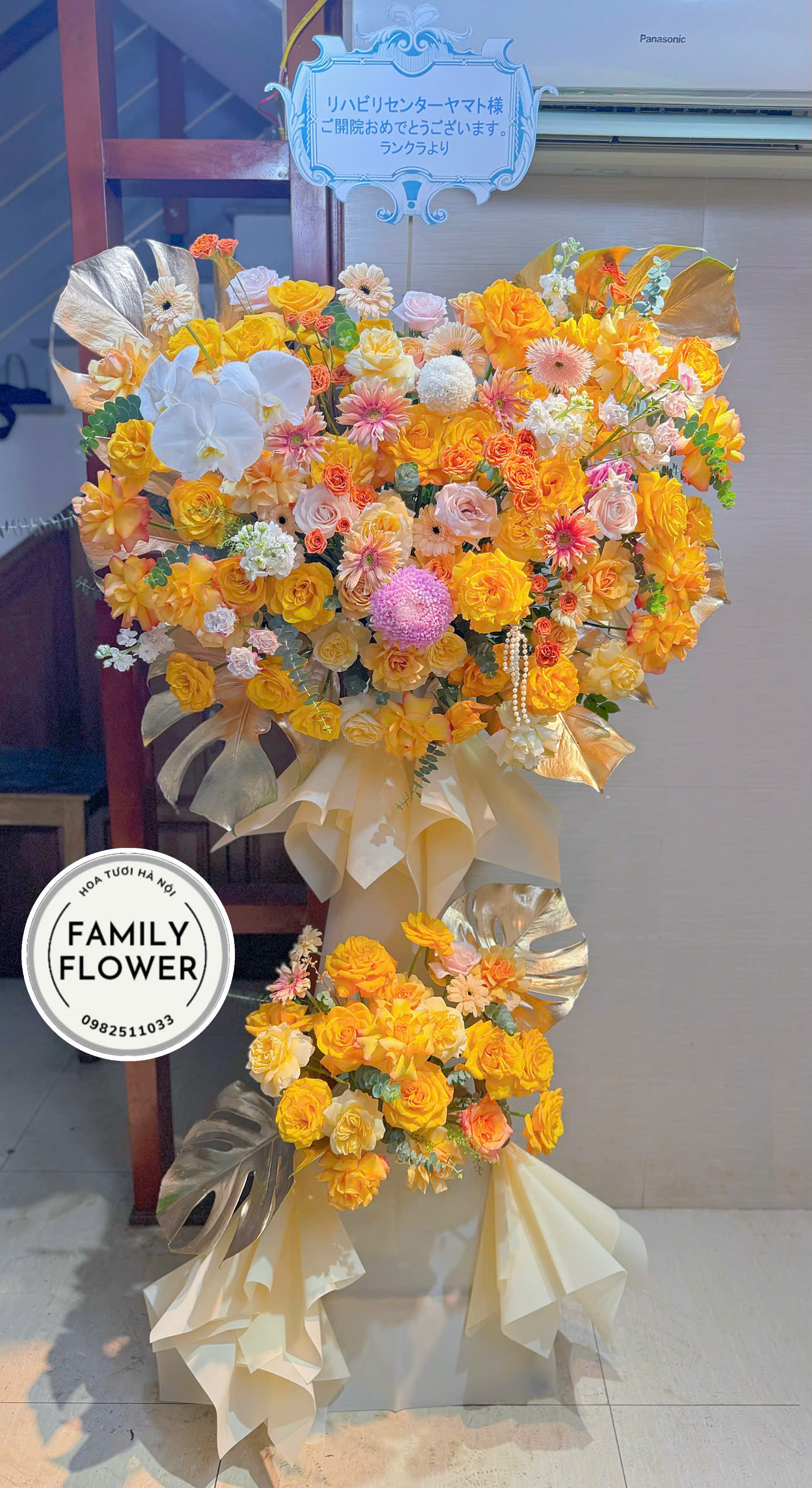 Kệ hoa 2 tầng tone vàng cam tặng khi trương quận Đống Đa ! Hoa khai trương Hà Nội ! Hoa khai trương