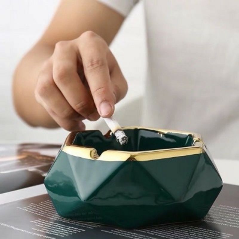 Gạt tàn tròn viền vàng