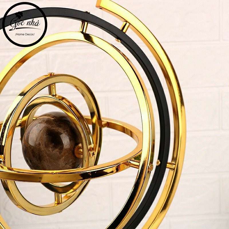 Phù điêu địa cầu vàng kim nguyên khối