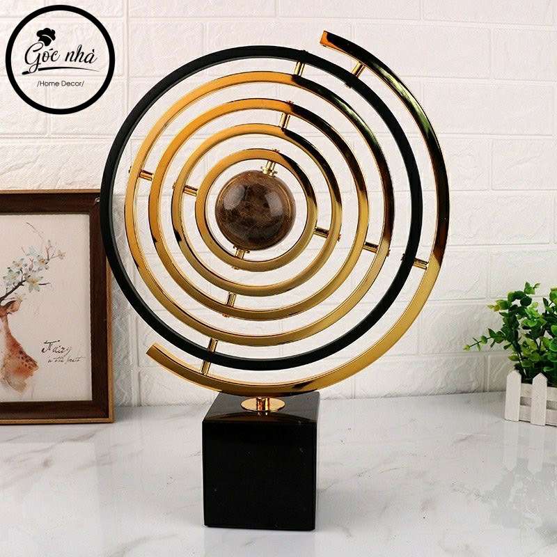 Phù điêu địa cầu vàng kim nguyên khối