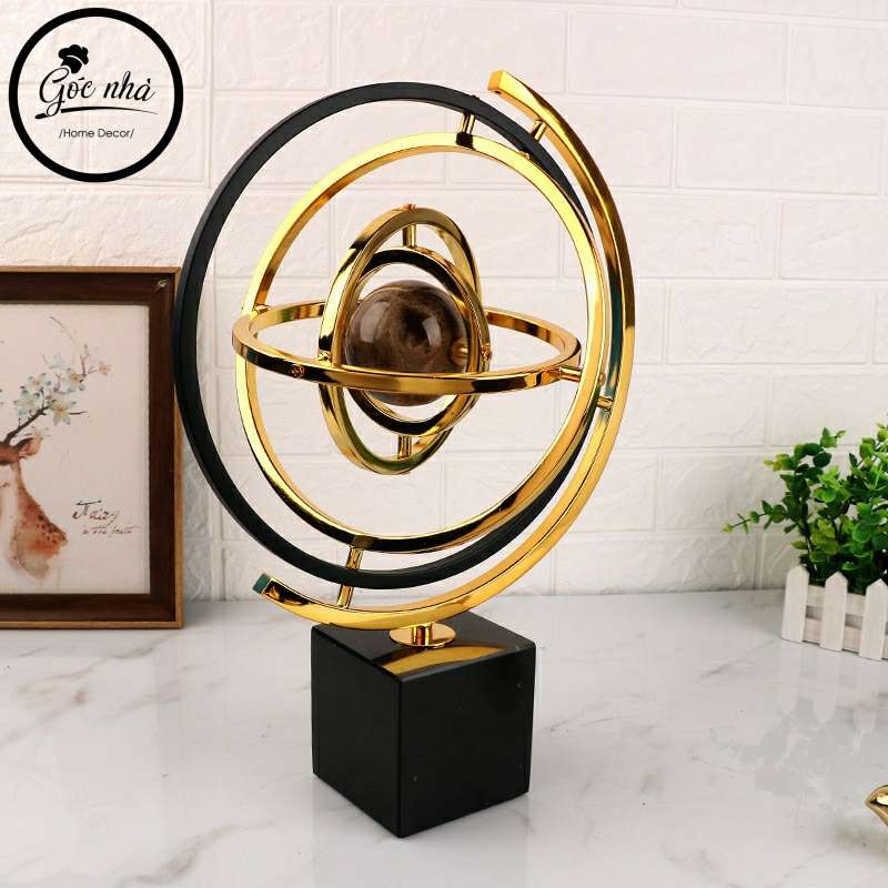 Phù điêu địa cầu vàng kim nguyên khối