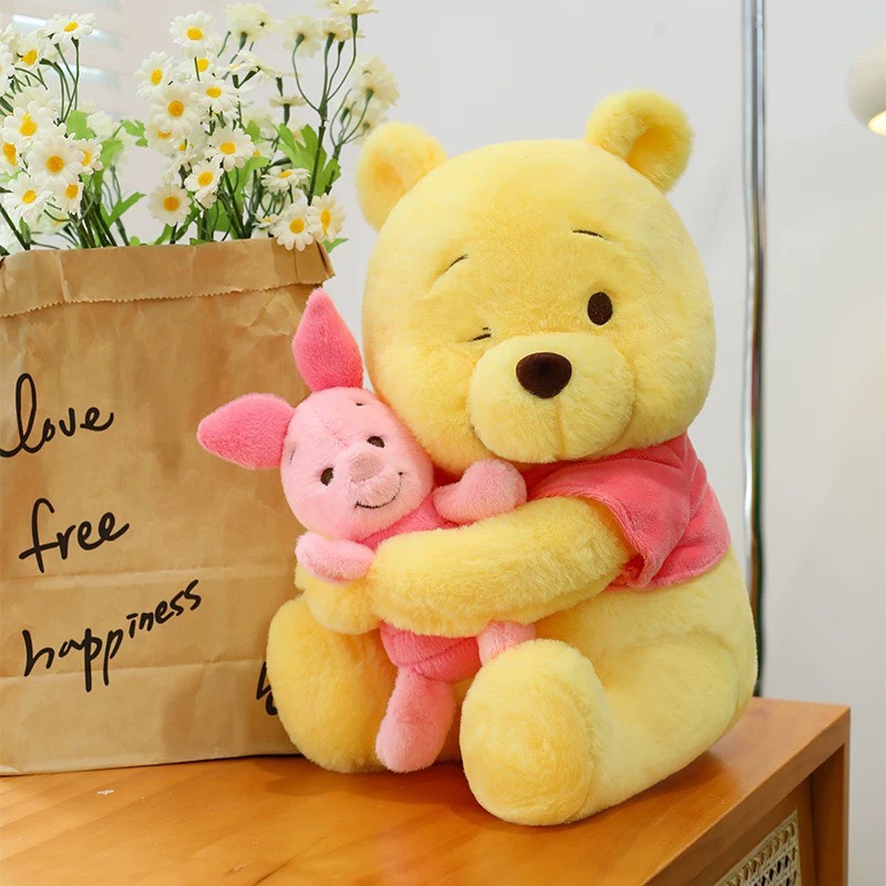 Gấu Pooh ôm heo Piglet