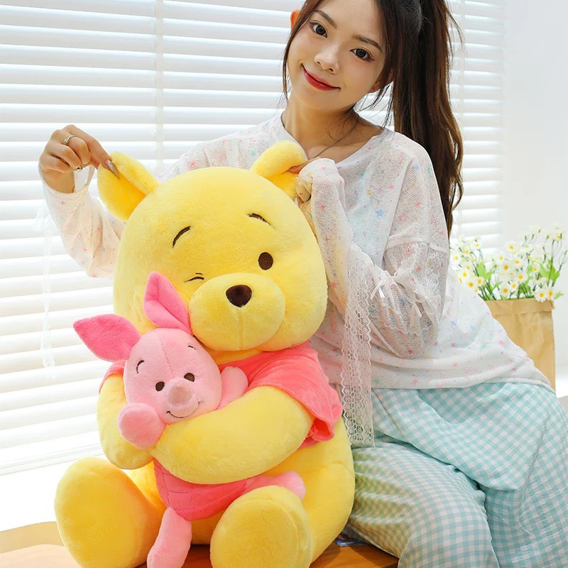 Gấu Pooh ôm heo Piglet