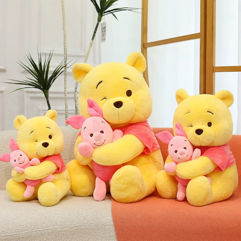Gấu Pooh ôm heo Piglet