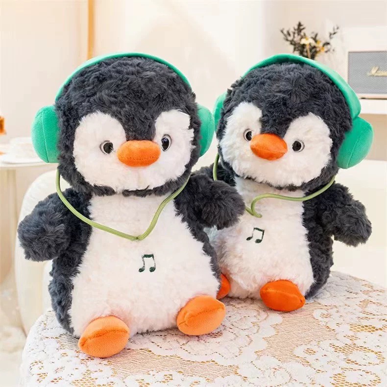 Gấu bông chim cánh cụt tai nghe 40cm