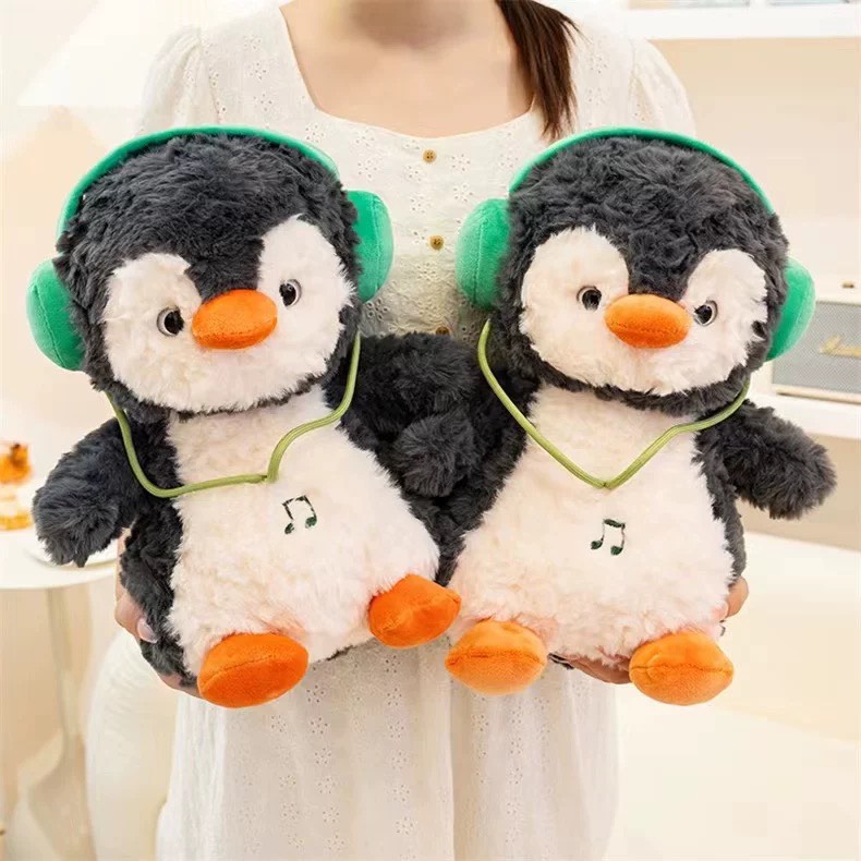 Gấu bông chim cánh cụt tai nghe 40cm