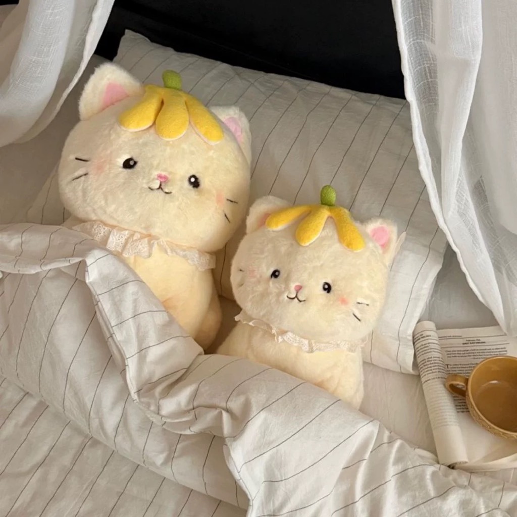 Gấu bông mèo mũ chuối