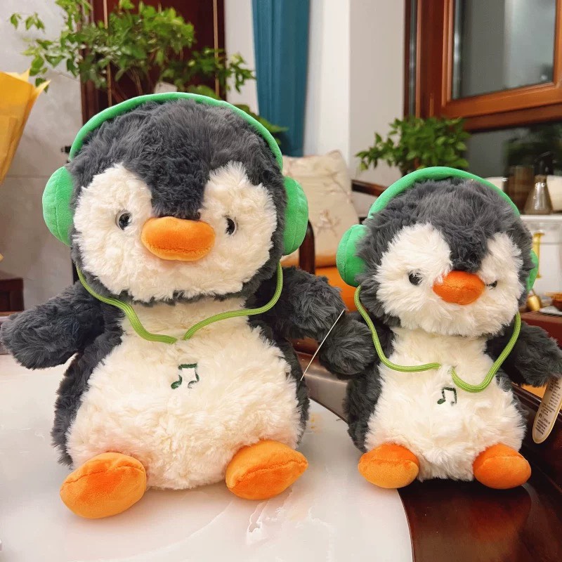 Gấu bông chim cánh cụt tai nghe 40cm
