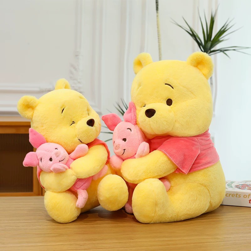 Gấu Pooh ôm heo Piglet