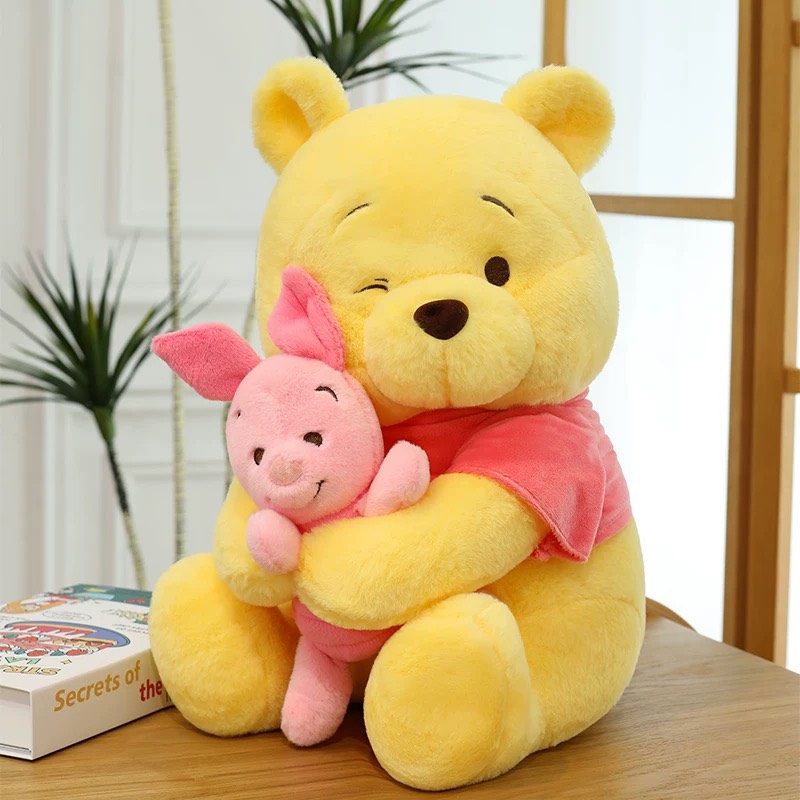 Gấu Pooh ôm heo Piglet