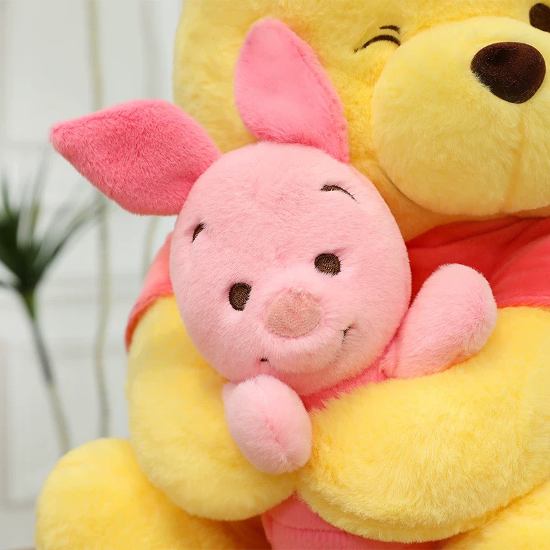 Gấu Pooh ôm heo Piglet