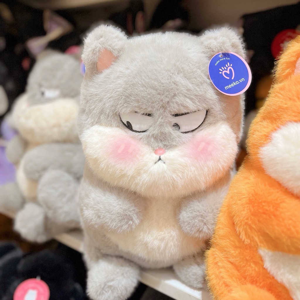 Gấu bông mèo lườm mắt liếc