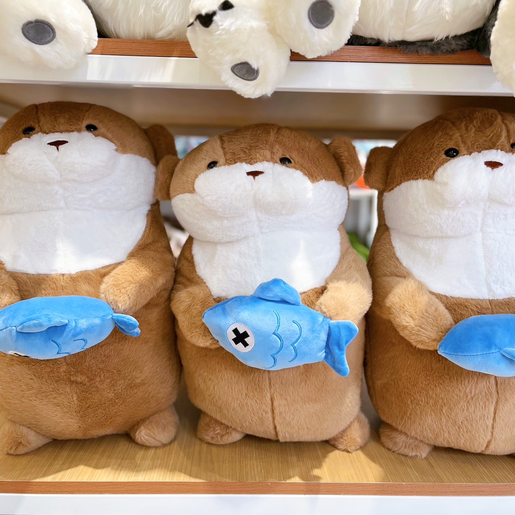 Gấu bông rái cá Mimi ôm cá
