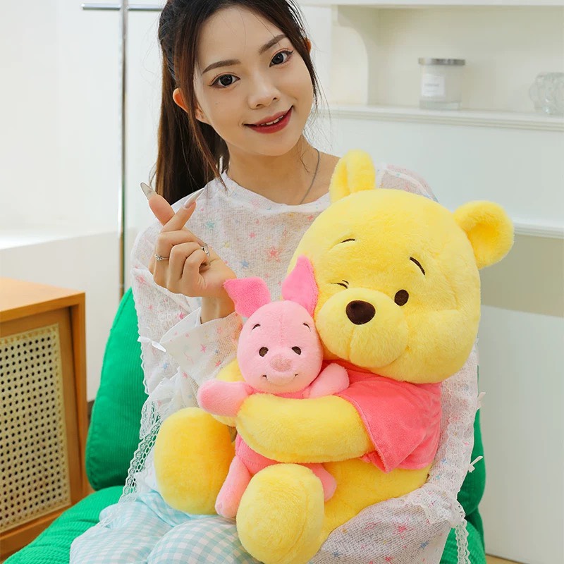 Gấu Pooh ôm heo Piglet