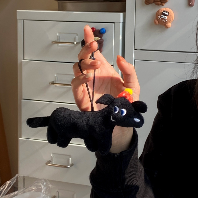 Móc khoá cún đen Noel