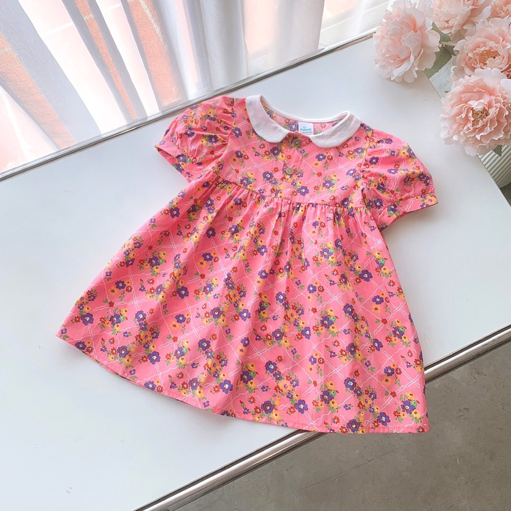 Đầm hoa hồng cổ sen trắng Op Kids