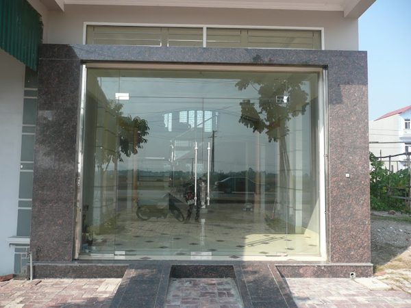 Cửa kính thủy lực bản lề sàn