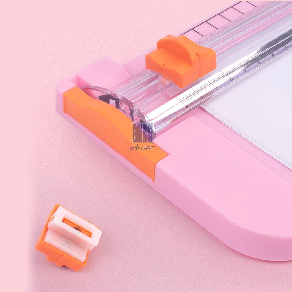 Bàn cắt giấy nhựa mini A4 dao trượt - Có Thước