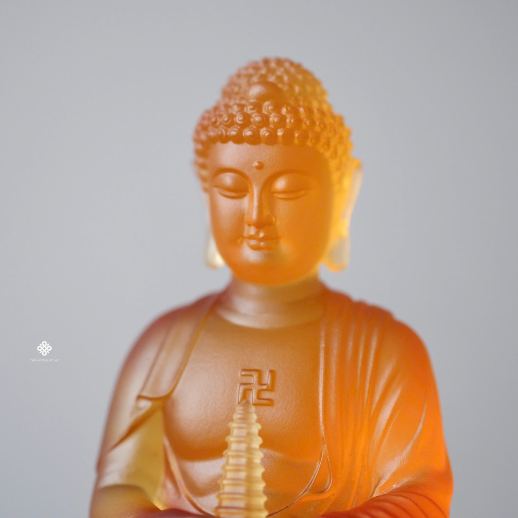 Tượng Đức Phật Dược Sư cầm bảo tháp lưu ly hổ phách 12.5cm