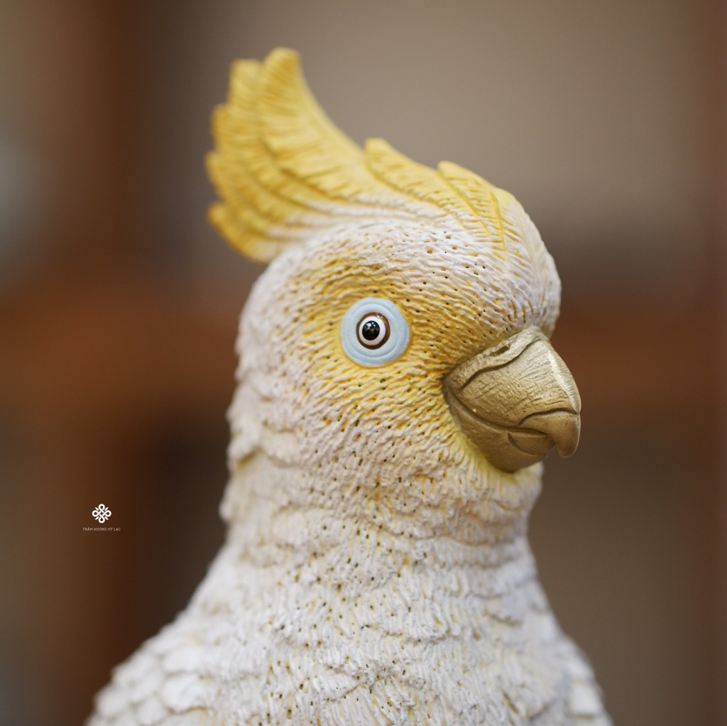 Tượng đồng vẹt mào hướng dương