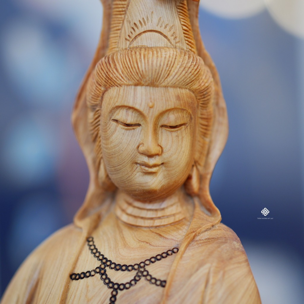 Tượng Quan Âm dòng suối cam lồ lũa nhai bách