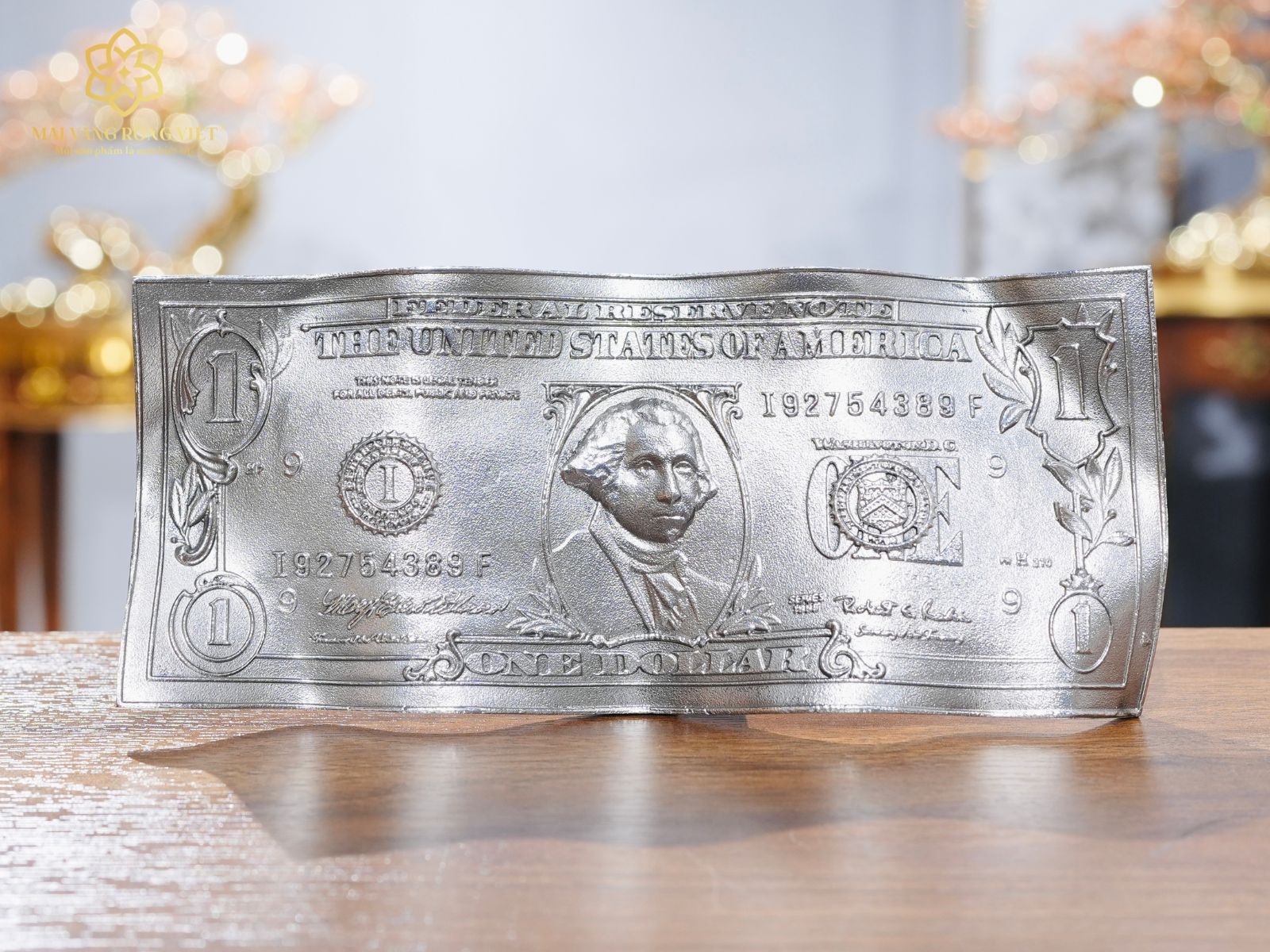 Mặt trước tờ 1 dollar màu bạc