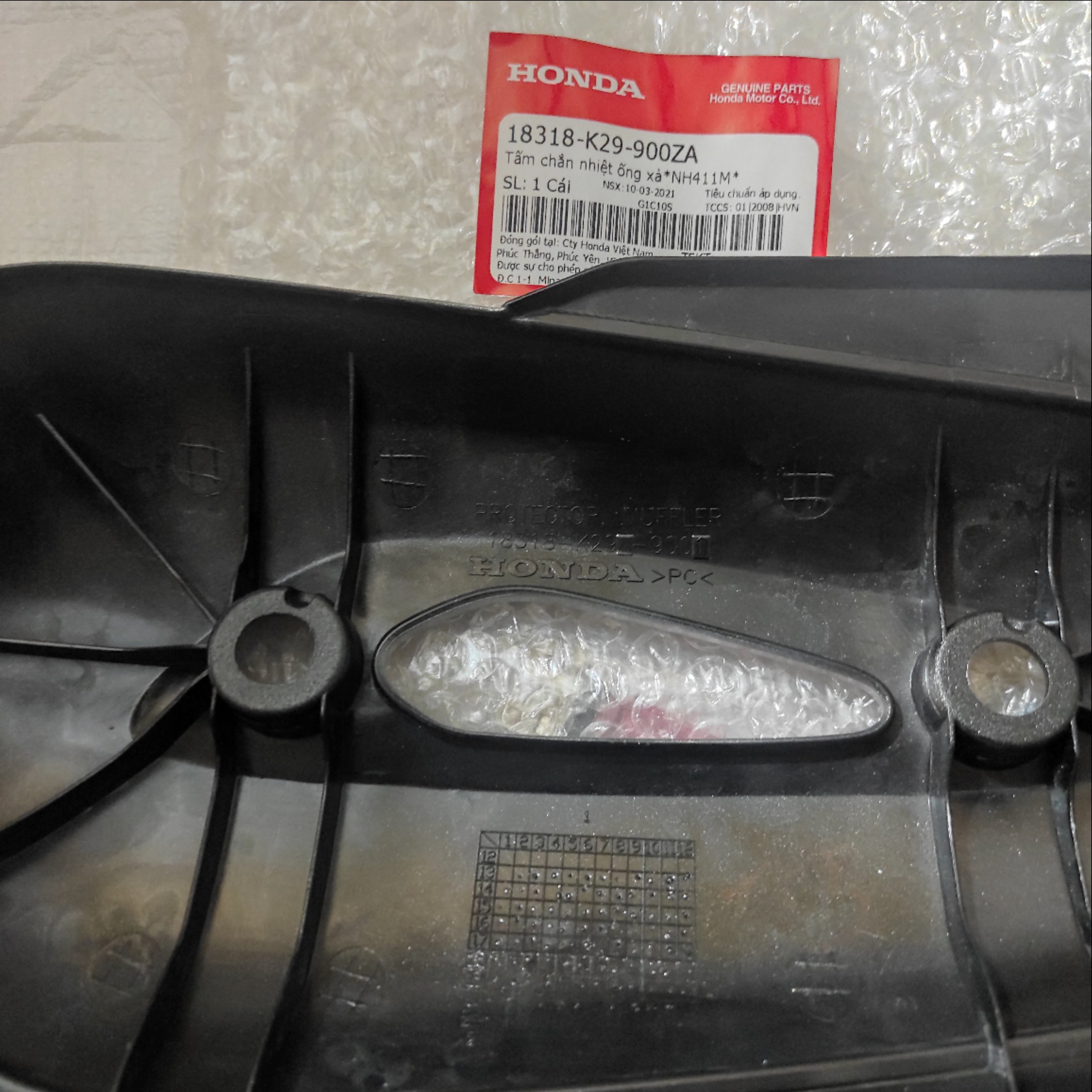 Tấm chắn nhiệt ống xả*NH411M*