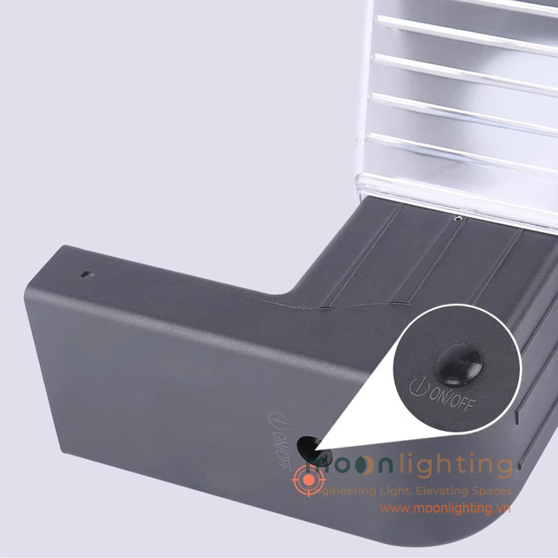 Bề mặt thân nhôm và nút nguồn chống nước đèn MG-SL1509 Cận cảnh bề mặt thân nhôm đúc phun cát mờ và nút nguồn công tắc bật tắt chống nước của đèn gắn tường năng lượng mặt trời MG-SL1509 Moon Lighting
