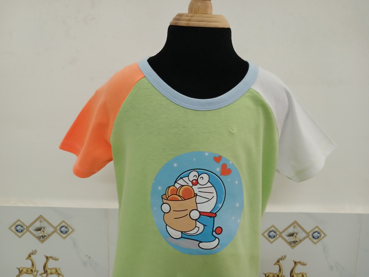 ÁO TSHIRT UNISEX PHỐI TAY RAGLAN DOREMON XANH CHUỐI SỐ 2