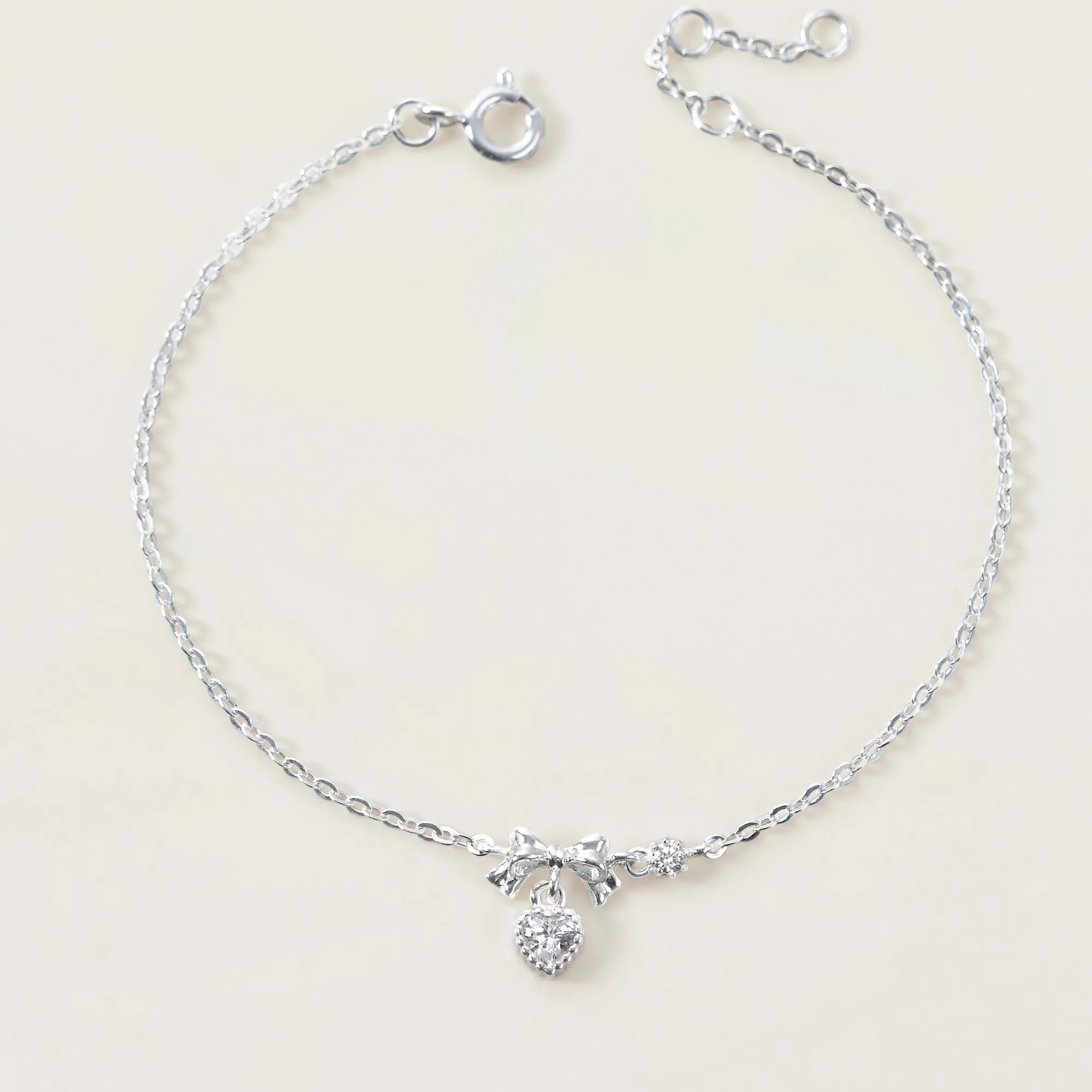 Lắc Tay Bạc 925 Hình Nơ Treo Trái Tim Đính Đá - Heart Bow Tie - VGB14