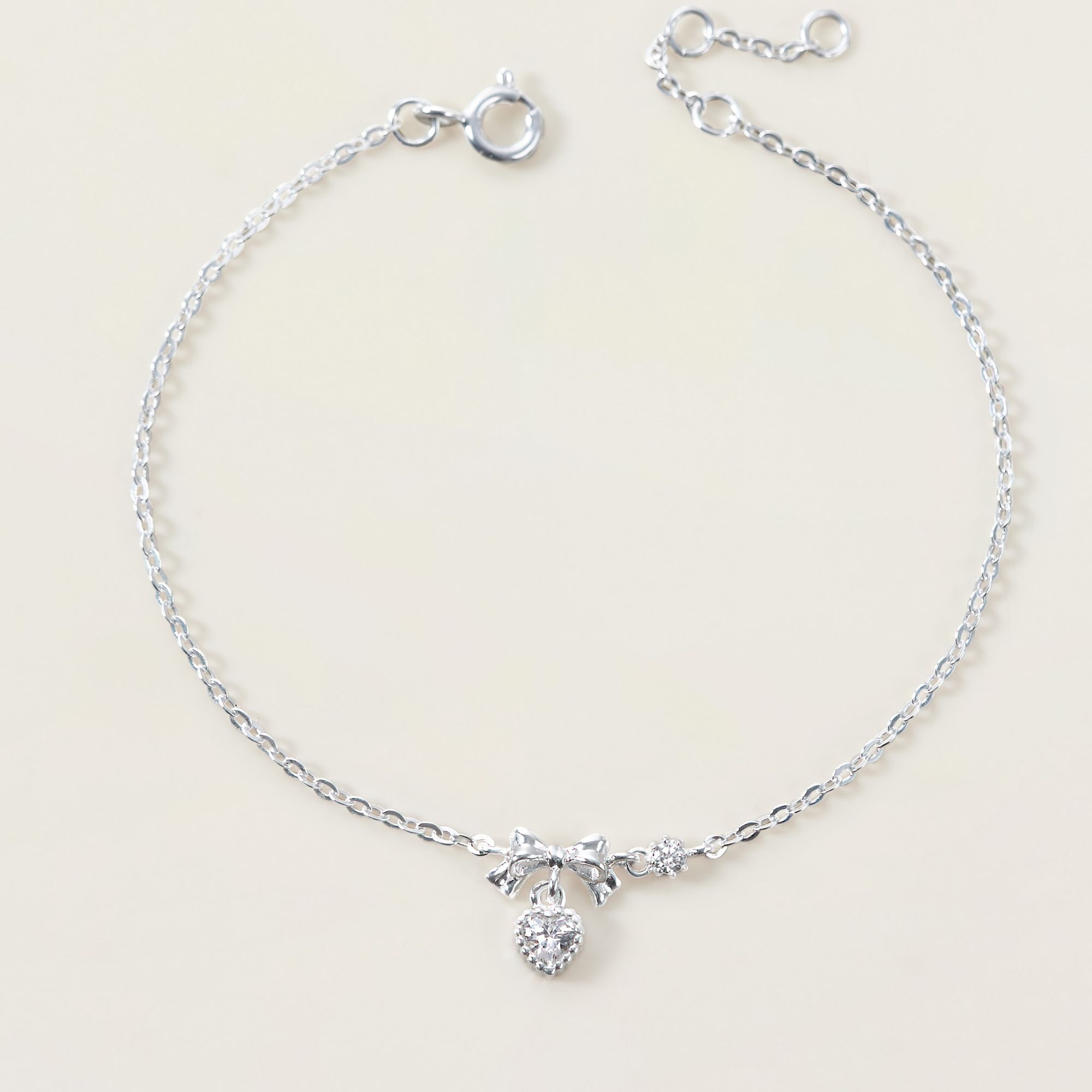 Quà Tặng 8/3 Lắc Tay Bạc 925 Hình Nơ Treo Trái Tim Đính Đá CARA LUNA - Heart Bow Tie - VGB14