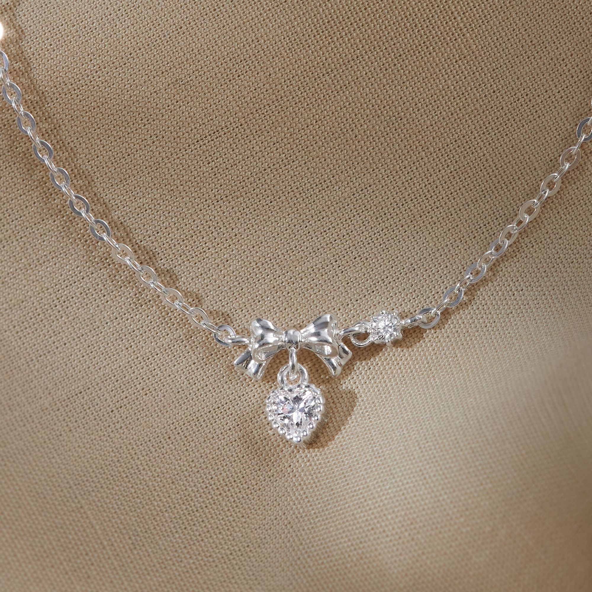 Quà Tặng 8/3 Lắc Tay Bạc 925 Hình Nơ Treo Trái Tim Đính Đá CARA LUNA - Heart Bow Tie - VGB14