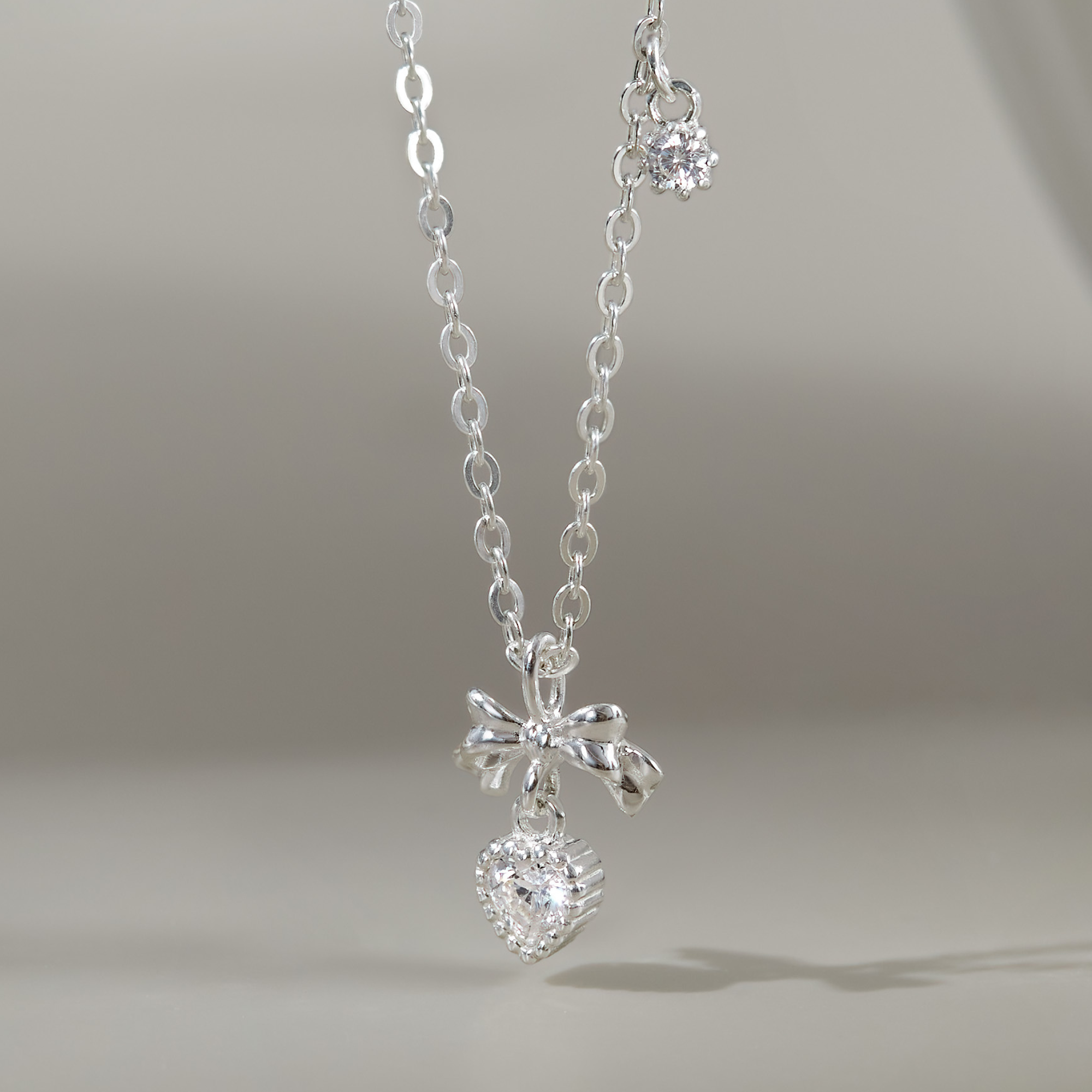 Quà Tặng 8/3 Dây Chuyền Bạc 925 Hình Nơ Treo Trái Tim Đính Đá CARA LUNA - Heart Bow Tie - VGN20