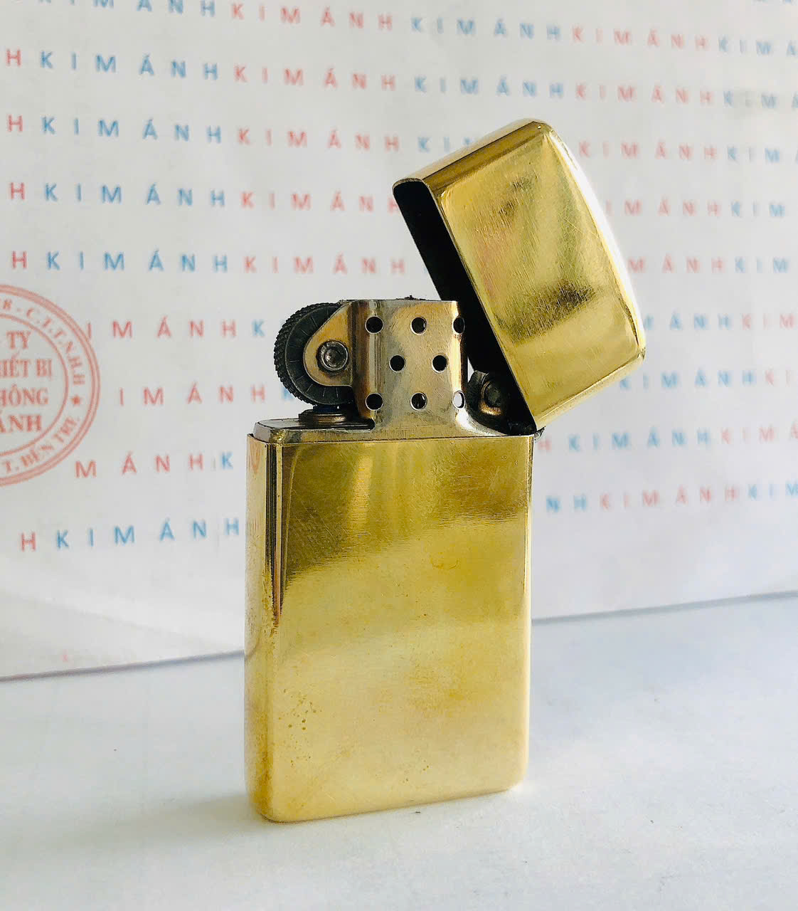 Bật lửa Zippo Slim Mỹ Brass trơn sản xuất 1989, Cam kết hàng chính hãng có giấy Hải quan gửi kèm theo đơn hàng
