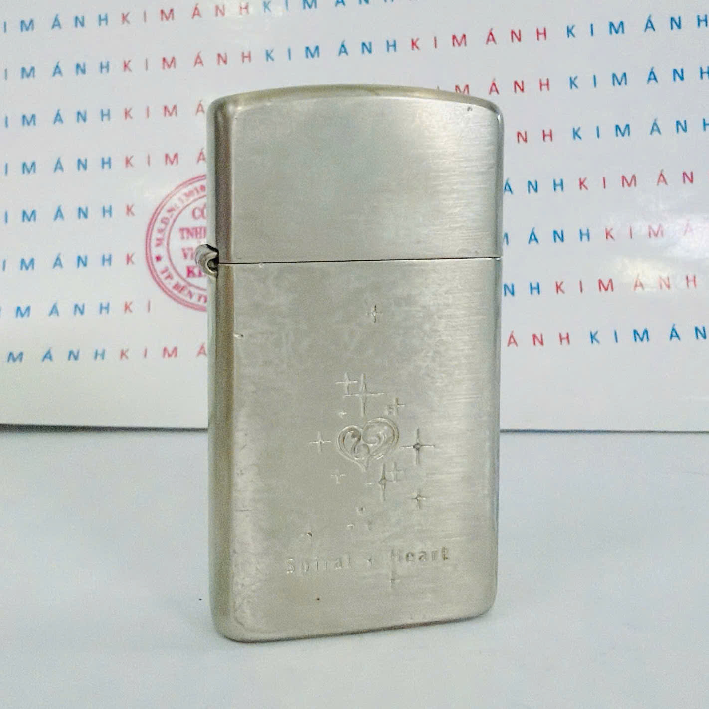 Bật lửa Zippo Slim Mỹ Chủ Đề Spiral Heart No.147, hàng chính hãng có giấy Hải quan gửi kèm đơn hàng
