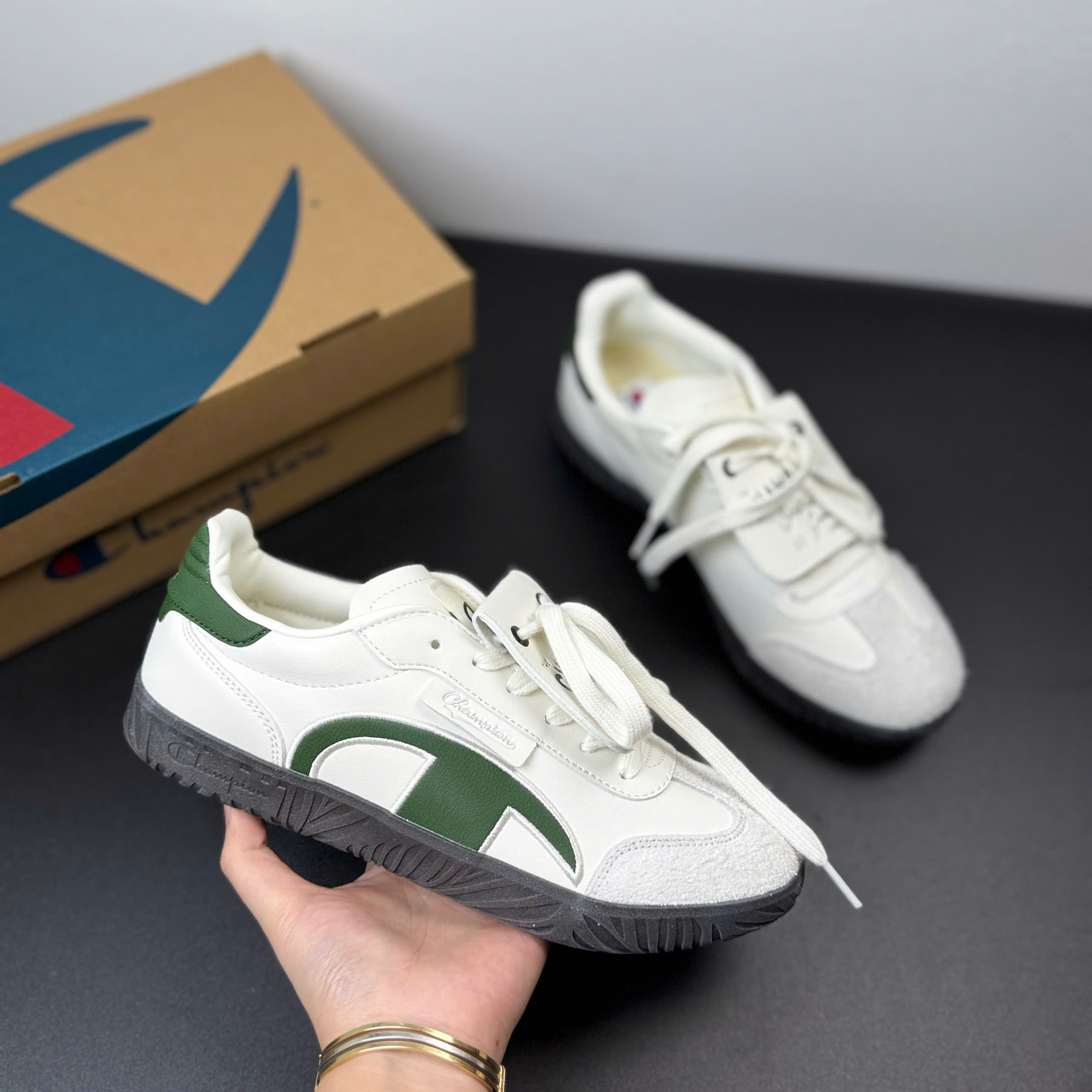 champion xanh lá