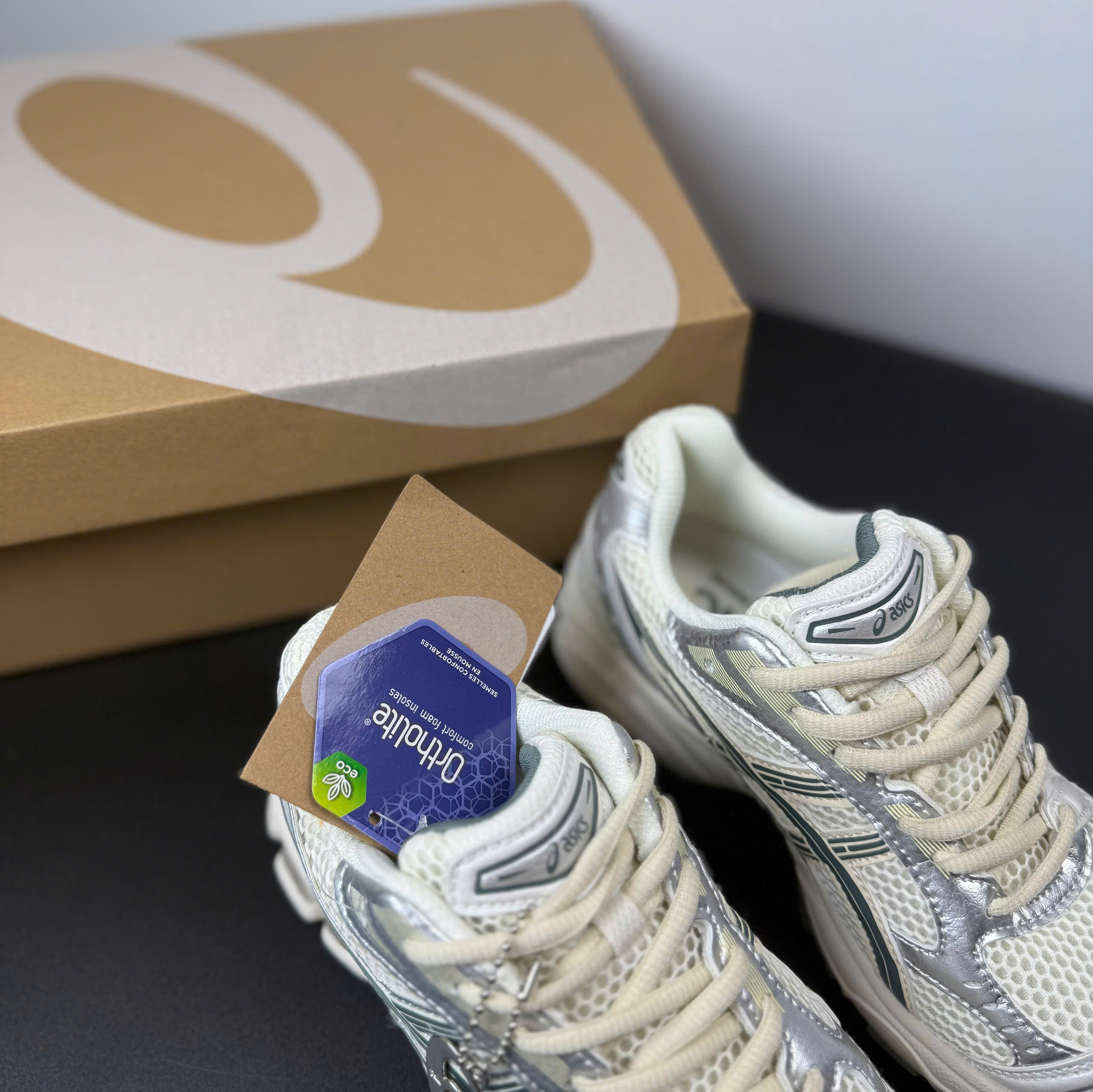 asic kayano xám kem