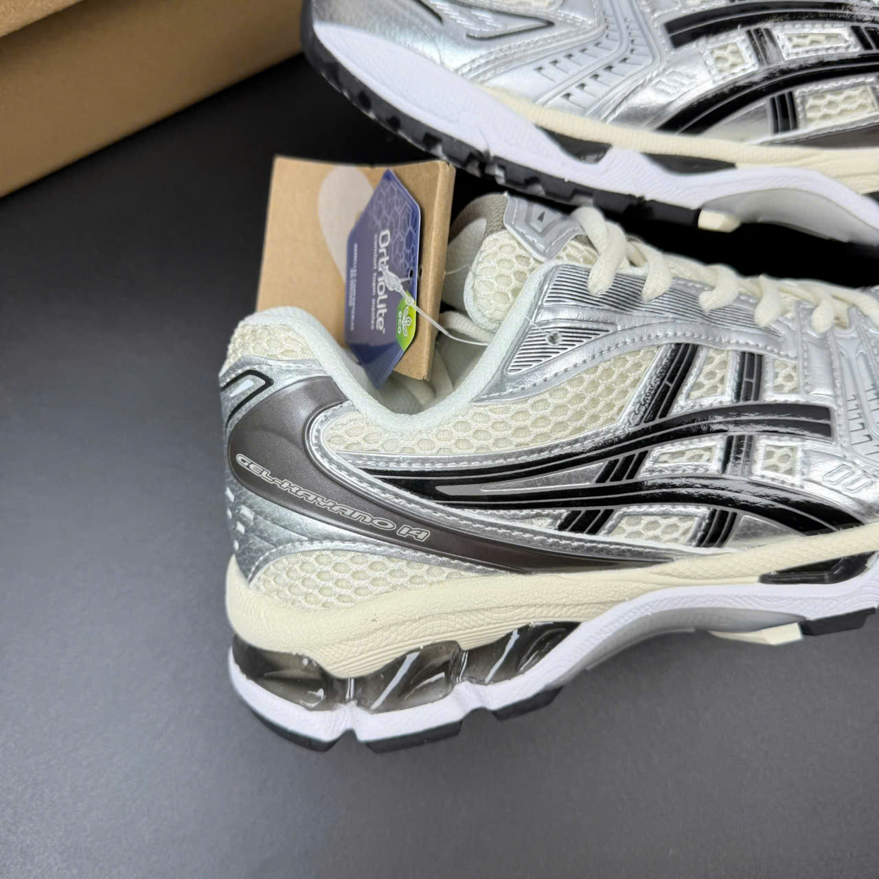 asic kayano đen kem